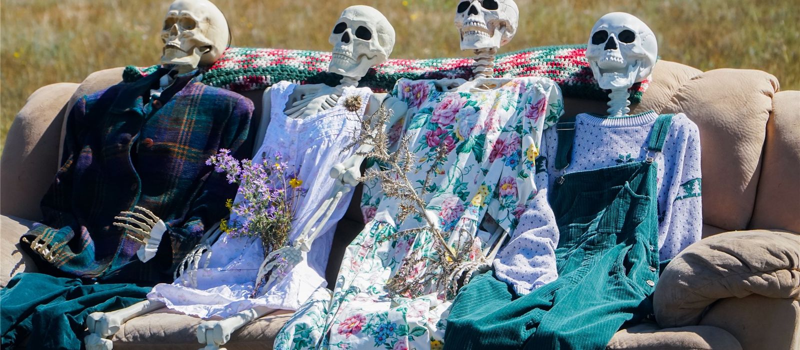 Skeleton family on a couch in a field, from the My Blood is Blue shoot